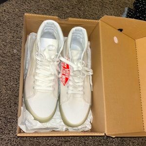 BRAND NEW vans Sk8 with clear bottoms.